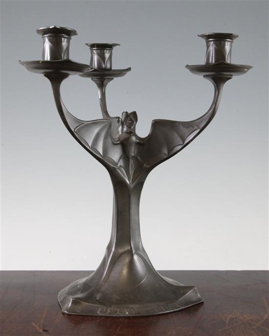 Hugo Levin. A Kayserzinn pewter three branch bat candelabrum, 12.5in.